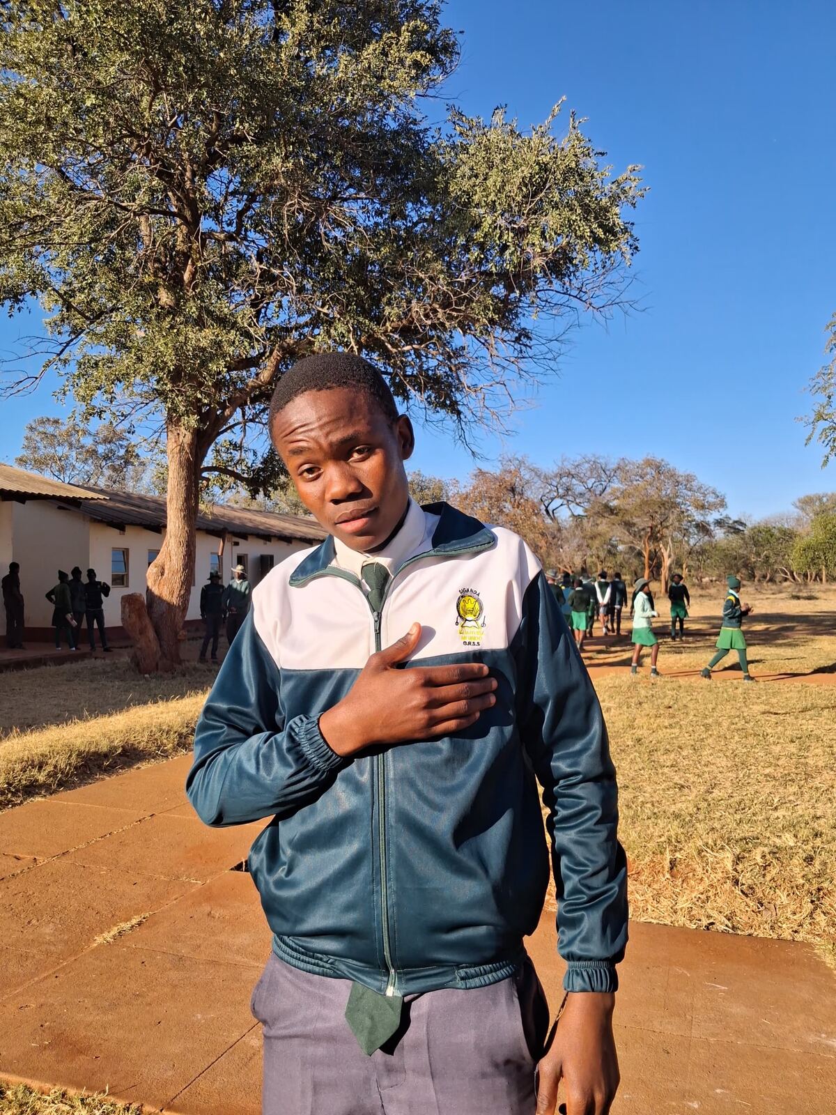 Male learner in school uniform and blazer